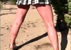 cutie in mini pees standing up