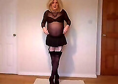 Gothic look with stockings, short skirt and heels