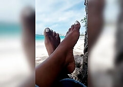 Relaxing outdoors in the tropical sunlight and consummate sea breeze.