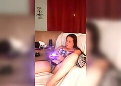 I lift up my micro minidress and show off my panties and spread my legs on couch while playing games