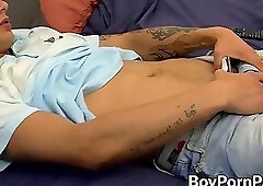 Lovely tattooed twinkie tugging his cock while undressing