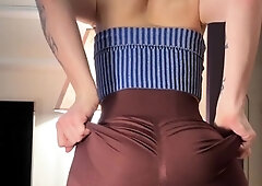 Seductive young brunette showing off her wonderful ass