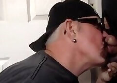 Mature gay closeup sucks and jerks cock through gloryhole