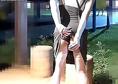 Masturbating with a dildo behind passers-by