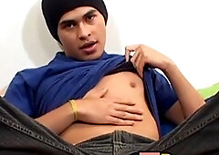 Twink jerks off rock-hard in his bedroom while finger-tickling his butt