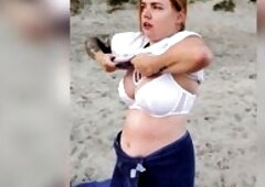 POV. U see as a breasty model, unaware of your presence, disrobes in nature's garb on the beach, bathes, and plays in the sand.