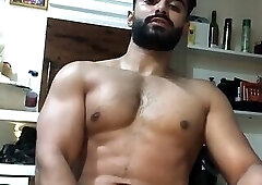 Handsome hunk stroking his thick cock