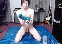 Twink's backdoor stretched wide, leaking cum