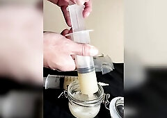 Loading 2 big sized syringes of my thawed cum loads to inject into my wife’s vagina
