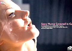 Her strapless dildo squirts all over her GF's charming face