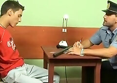 Police officer Roberts bangs hot twink Ian on a office desk