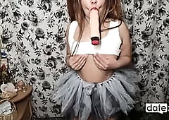 A ponytailed Oriental chick wearing a fairy dress uses a sex toy to enjoyment herself