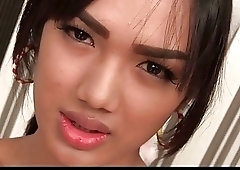 Asian ladyboy wastes no time toying her ass and masturbating