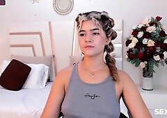 Dorm hoe with pony tails shows shows us her perfect boobs.