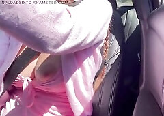Large tits flashing in the car
