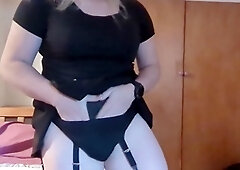 Naughty shemale pleases herself with a dildo, vibrator and tight ass on the couch