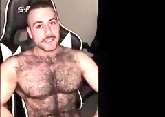 Muscled hairy dude teasing bushy pits