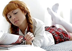 Curly-haired redhead Janette fucked by two hard dicks