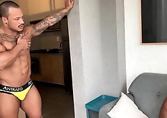 2 muscled, mischievous studs making out.
