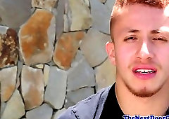 Muscular hunk strokes his thick cock