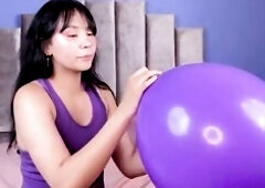 See me blowing a massive balloon with my wet lips until it's about to burst, my sexy breath making it grow larger a nd larger whilst my breasts r