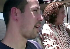 Horny big tits redhead gets picked up on the street and fucked in a threesome.