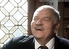 breasty woman sucks grandpapa behind desk