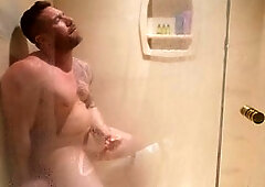 Fit jock takes ass in shower