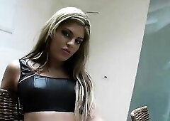 Delightsome blond wearing nylons whilst masturbating in solo action.