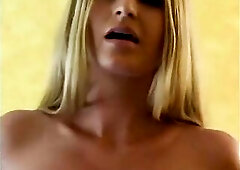 Sexy blond large mouthful of penis in office.
