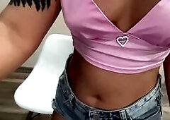 Tattooed Blonde Teases in Pink Top