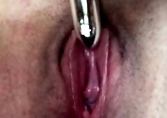 Fingering her pussy up close and cumming