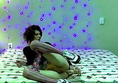 Sexy shemale Ria Bentley pleasures her ass with toys and cums on her own face