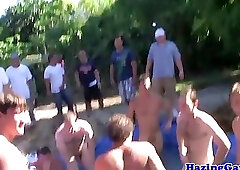 Outdoor students cocksucking for initiation