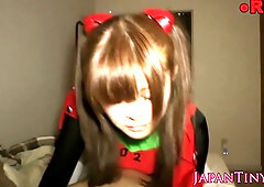 Japanese teen in costume riding on a large pecker