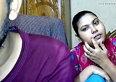 Newlywed couple and their friend getting cozy in an Indian village