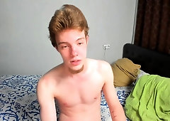 Busty redhead camgirl spreads her sexy legs for a meat stick