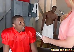 Single, blonde mom is having hot sex with two, black men, in the locker room
