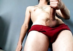 Red briefs against the wall