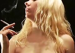 Cute youthful blond teen alone smokin' nude.