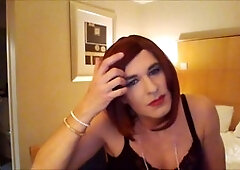 Hands-free cumshot in hotel room by sexy crossdresser on webcam