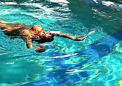 Hypnotizing mermaid Heidi Van Horny is masturbating pussy by the poolside