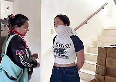 Nana Macaya, an eighteen-year-old with braided ponytail, t-shirt and panties, is alone in her bedroom watching slavery vids on her phone, lost in her 