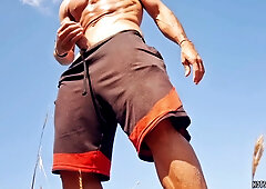 Pervy stud jerks his fabulous jizz-shotgun in a public beach