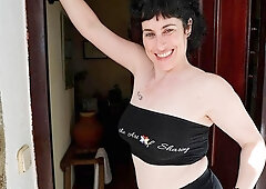 Awesome granny with big boobs Emmita Smile plays with her crack