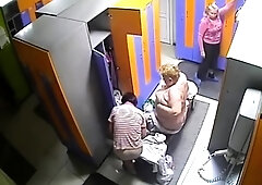 Spy cam in locker room captures mature women getting naked