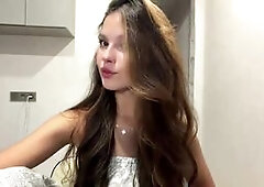 Stunning Brunette Model Teases in Sparkly Outfit