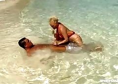 Kathy Anderson Goes Wild On A Tropical Beach...