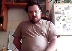 This fellow put his NUT SACK on the table and began wanking off his SCHLONG to taste the new JISM!