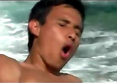 Gays have sex at the beach
